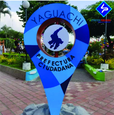 Icono metálico de  ubicación revestido de vinil adhesivo.